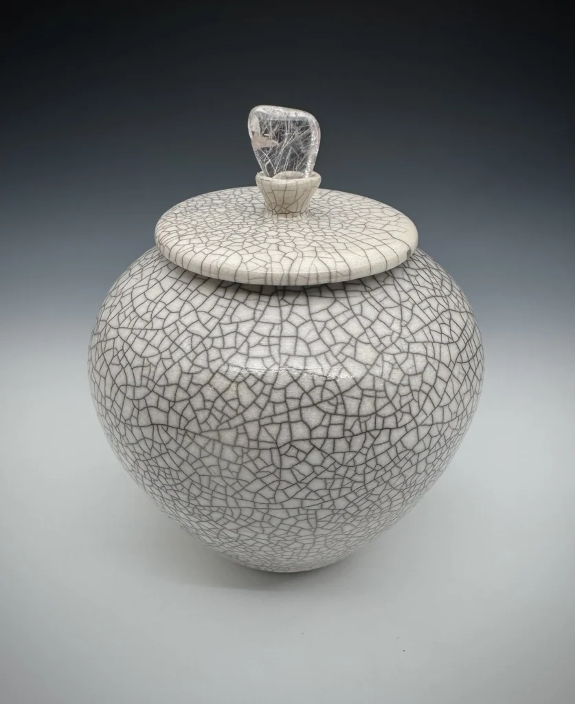 Porcelain Urn with rutilized crystal.